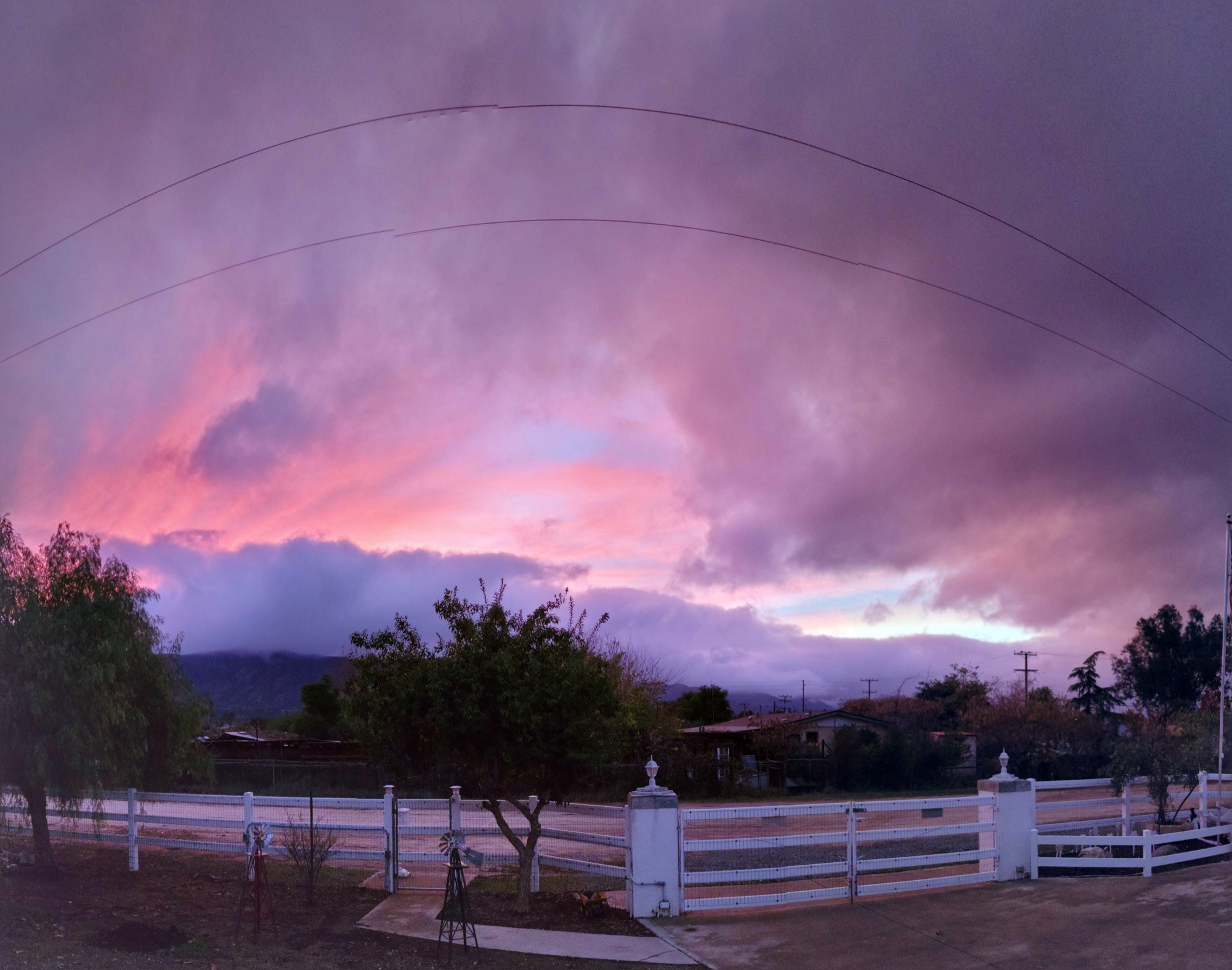 Panoramic sunset over the property